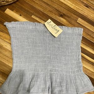 Strapless chambray top with flouncy ruffle